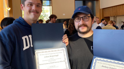 Colton and Anthony receiving awards for outstanding academic achievement and scholarship as recognized by the NIH Diversity Fellowship